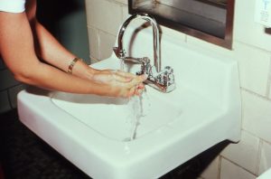 hand washing in sink